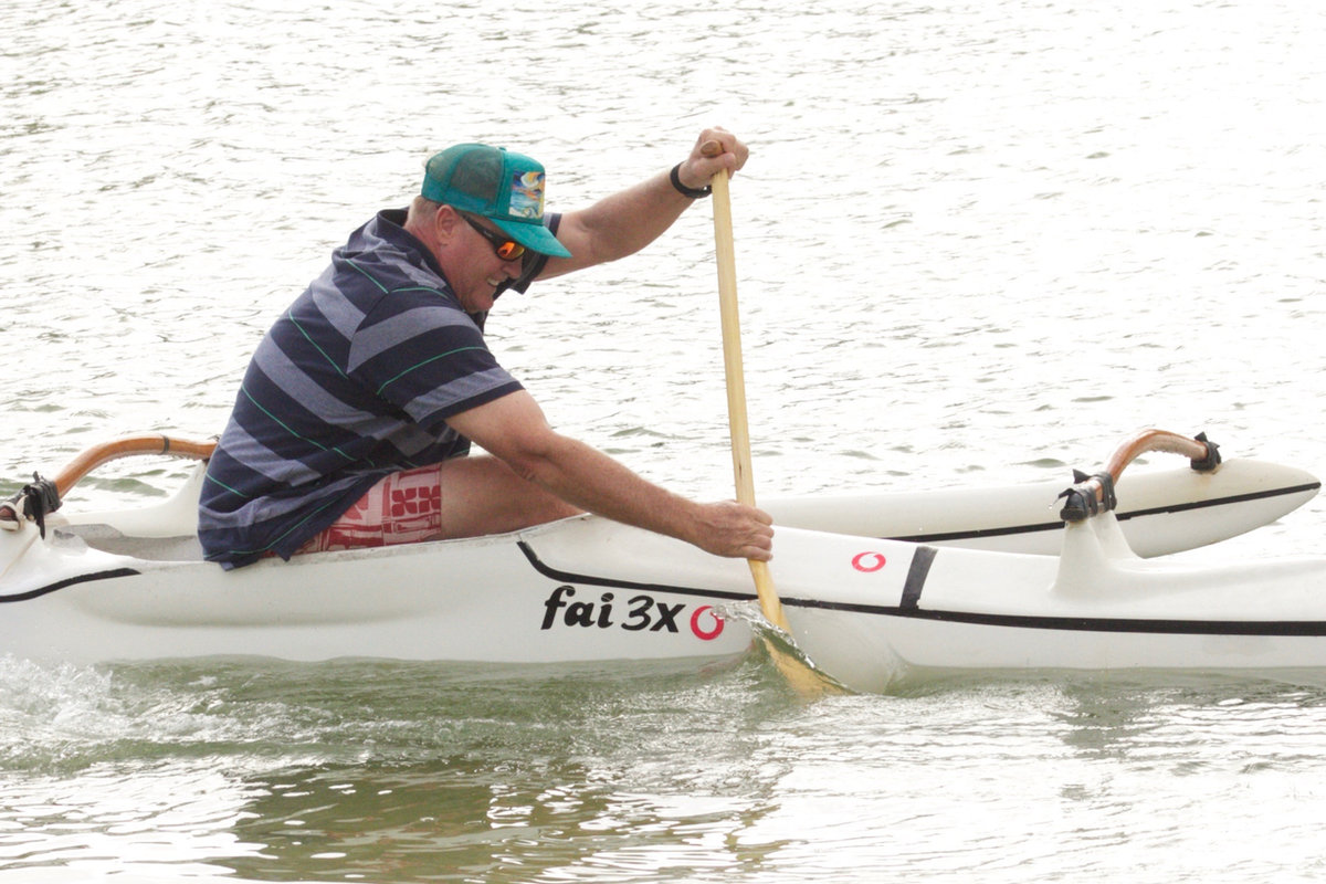 Kim Kalama coaching paddlers at Kailua Beach